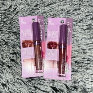 BRAND NEWW SET OF (2) “LE MERCERIE” FULL COVERAGE LIP GLOSSES
